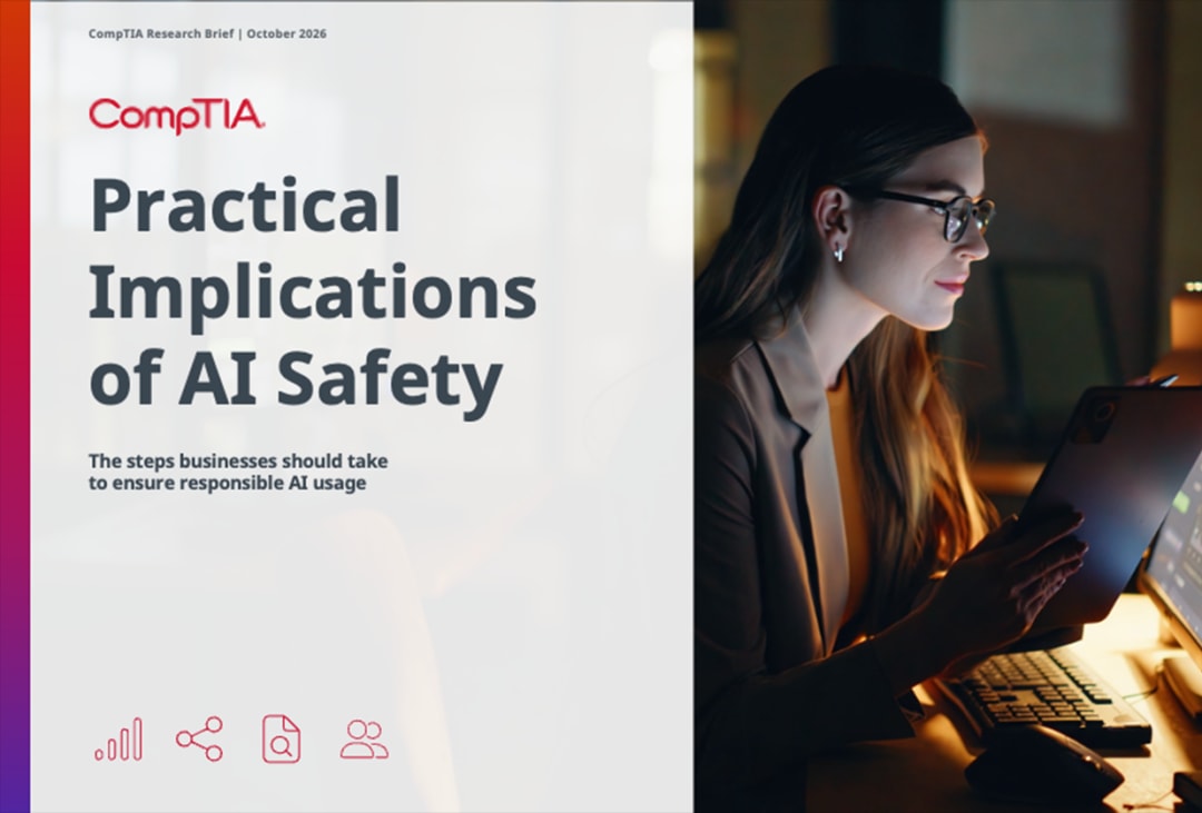 CompTIA Research Brief cover: Practical Implications of AI Safety featuring a woman working on a tablet at night